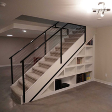 In this spacious basement remodel, we transformed a wide open area into a multi-room hangout spot.