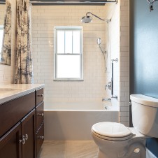 After these updates the bathroom feels bigger and is revitalized in a way that maintains its period look.