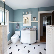 We transformed this bathroom by adding a zero-threshold shower where an unused whirlpool tub had previously been.