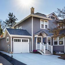  We built a wider garage to better accommodate the client's storage needs and improve ease of access. This new design blends seamlessly with the home’s existing architecture.