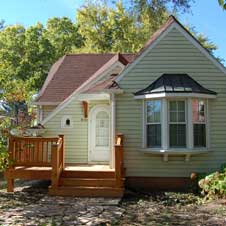 This front deck creates a space for homeowners to relax on sunny days.