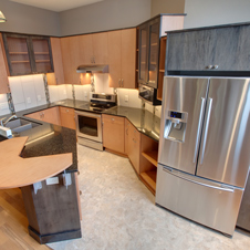 Contemporary styling headlines this condo kitchen remodel.