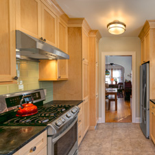 What was once a cloistered space is now an open, modern kitchen.