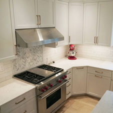 The all-white aesthetic of this kitchen lends a clean, contemporary feel.